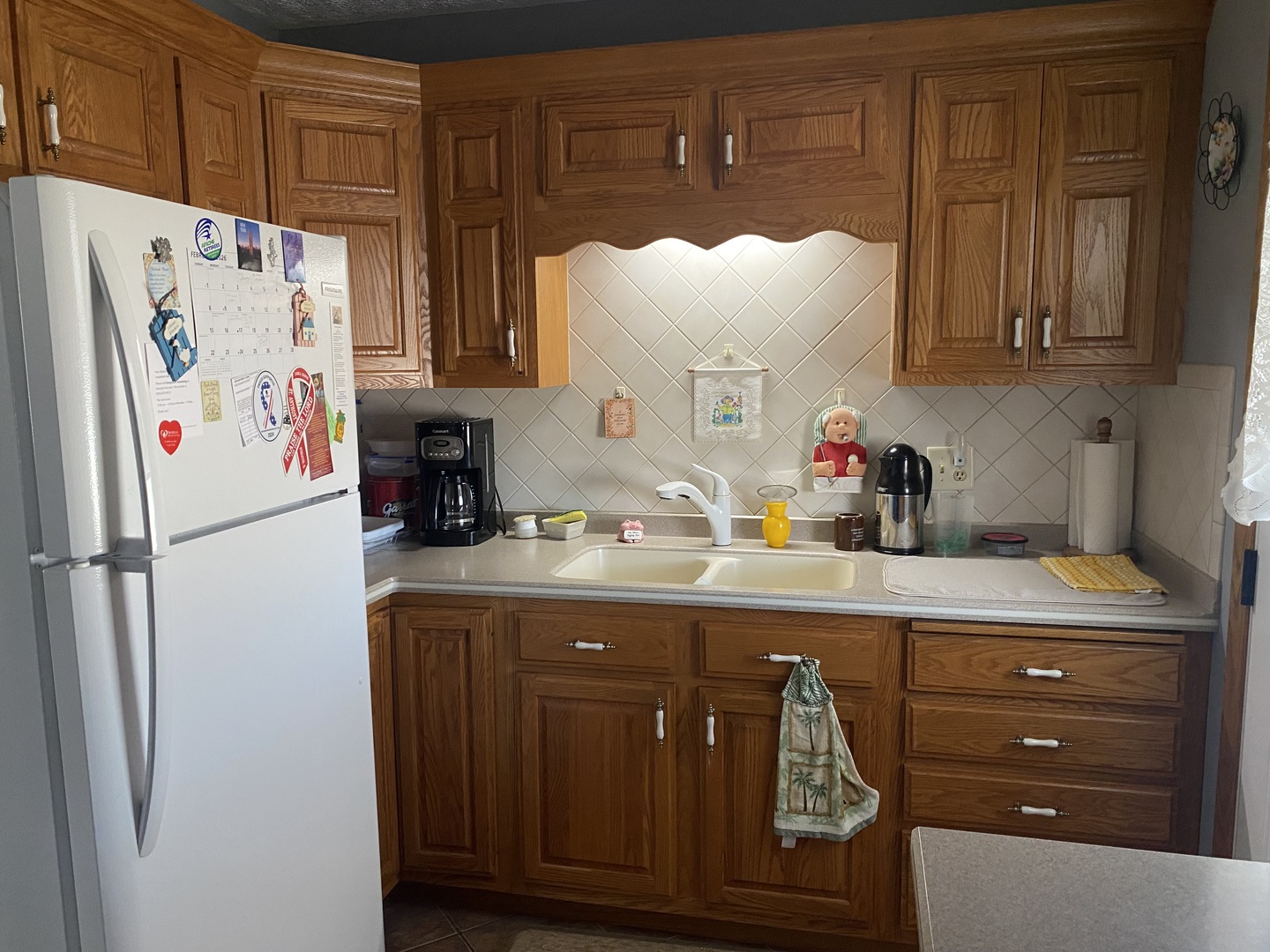 19 Capri Street Streator, IL 61364 - Photo 7 of 35 a kitchen with refrigerator and cabinets