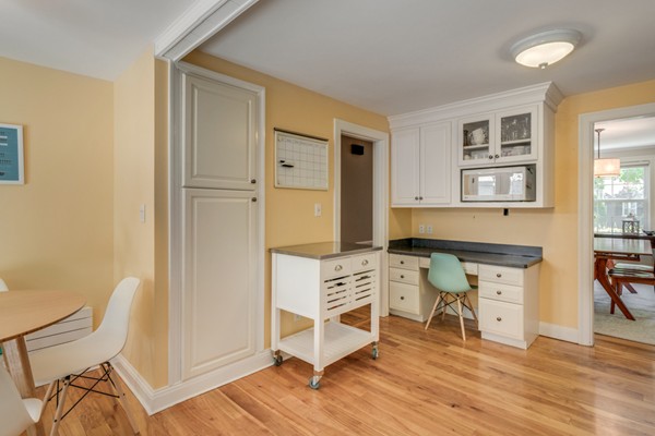 100 Mayflower Road Needham, MA 02492 - Photo 15 of 28 a view of a workspace with furniture and wooden floor