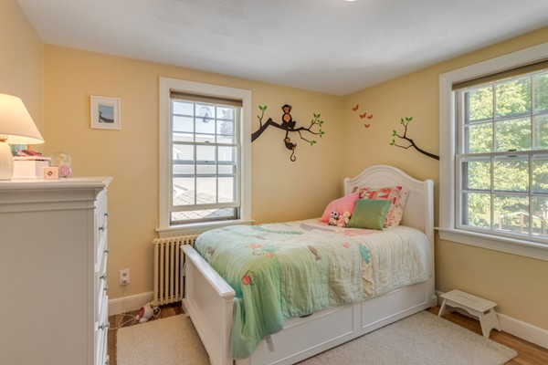 100 Mayflower Road Needham, MA 02492 - Photo 19 of 28 a bedroom with a bed and a window