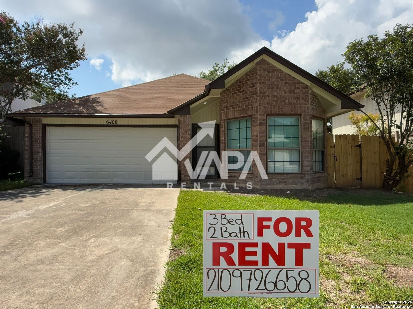 6406 Gray Ridge San Antonio, TX 78233 - Photo 15 of 15 a front view of a house with garden