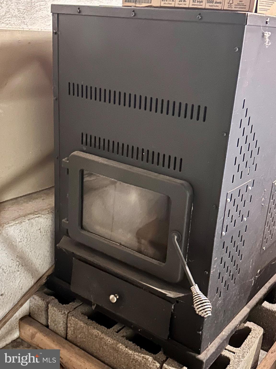 387 Mountain View Road Reading, PA 19607 - Photo 31 of 41 Pellet Stove (needs auger repair)