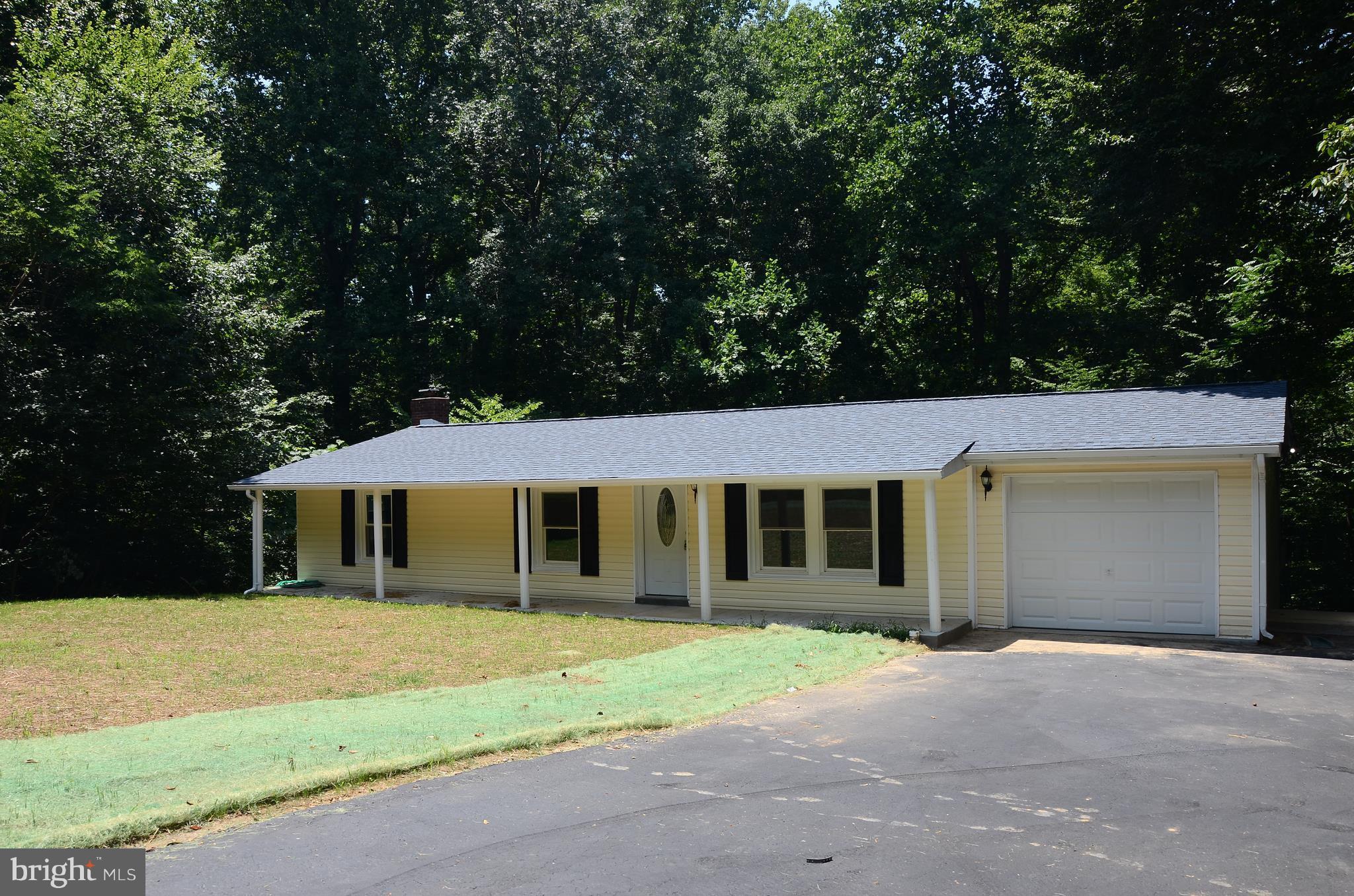 4750 Hardesty Road Huntingtown, MD 20639 - Photo 2 of 26 front view of a house with a yard