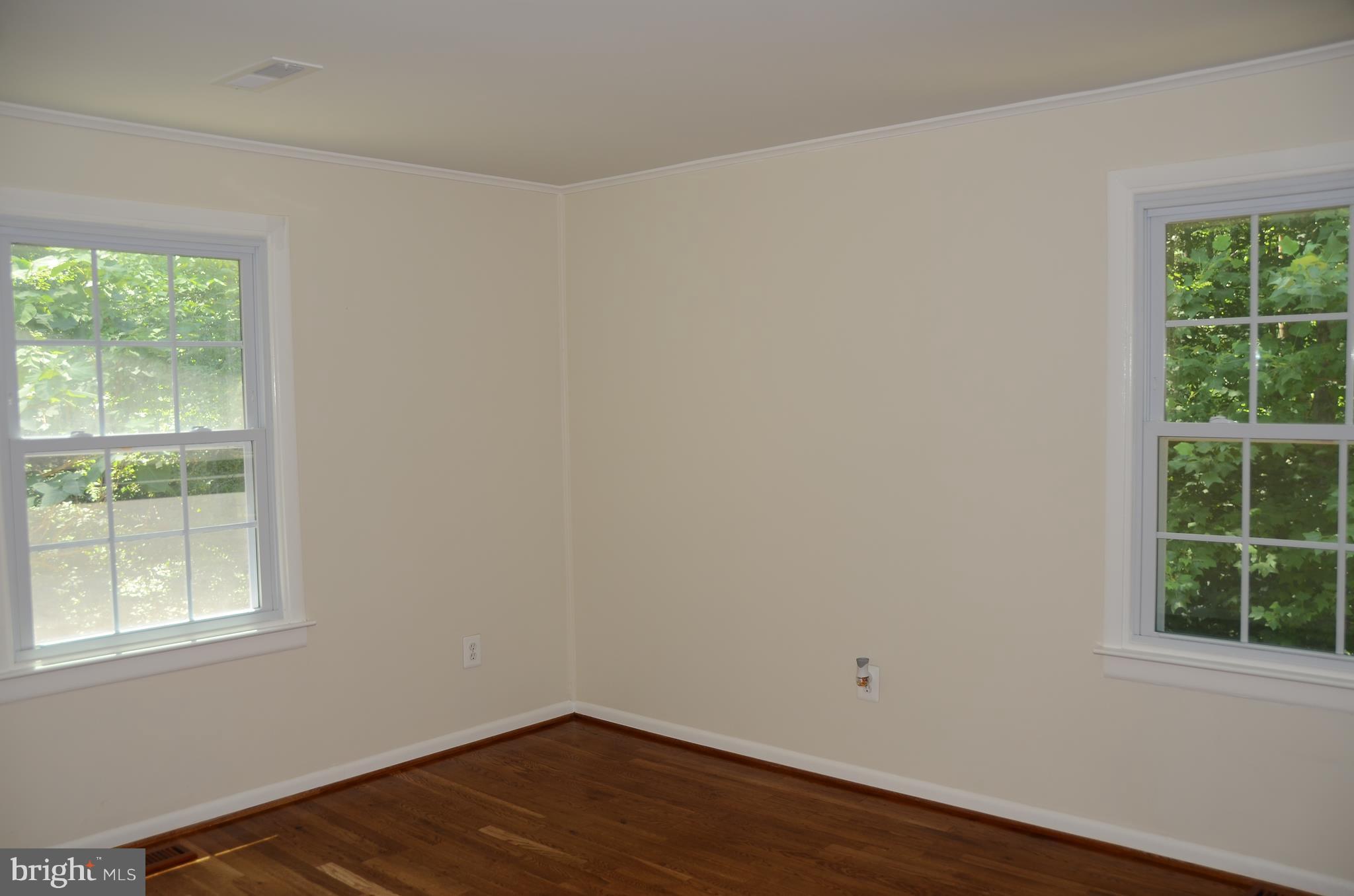 4750 Hardesty Road Huntingtown, MD 20639 - Photo 14 of 26 a view of a small space with wooden floor and a window