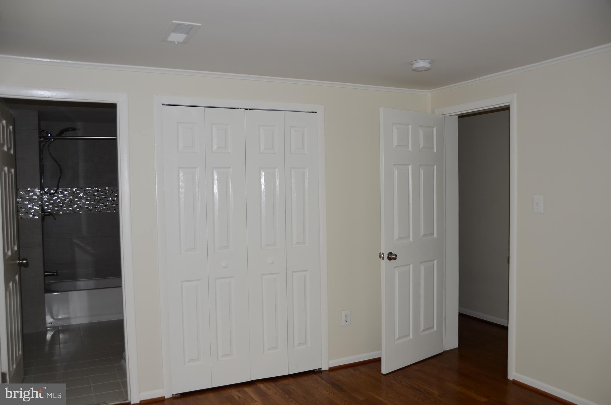 4750 Hardesty Road Huntingtown, MD 20639 - Photo 15 of 26 a view of a hallway with wooden floor
