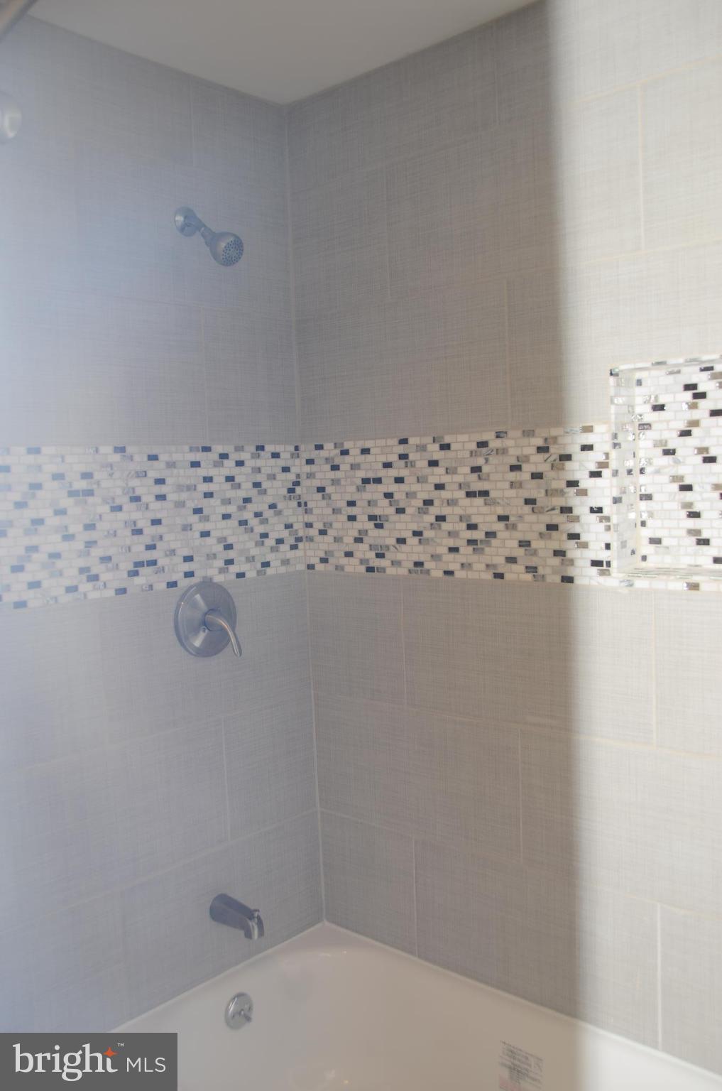 4750 Hardesty Road Huntingtown, MD 20639 - Photo 23 of 26 a bathroom with a bathtub