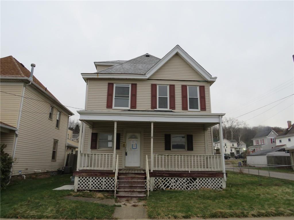 1203 2nd Avenue Conway, PA 15027 - Photo 1 of 43 a front view of a house with a yard