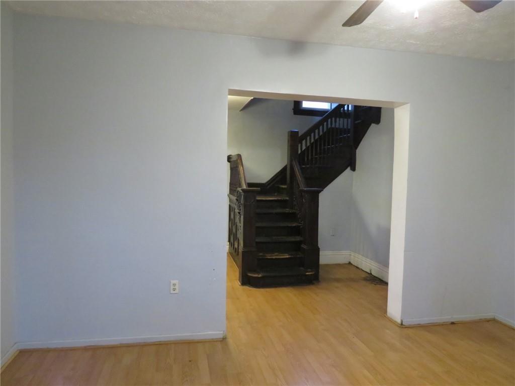 1203 2nd Avenue Conway, PA 15027 - Photo 36 of 43 a view of walk in closet with stairs