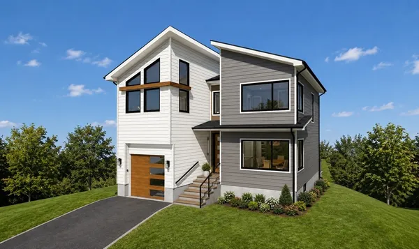 a front view of a house with a yard