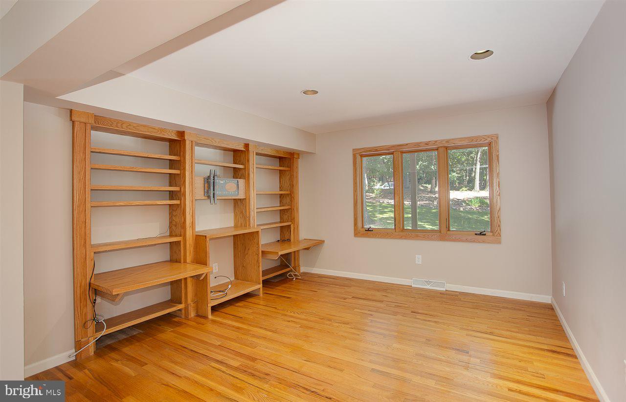 4720 Pine Ridge Road Harrisburg, PA 17110 - Photo 8 of 25 Built in Bookcases in quiet area of family room