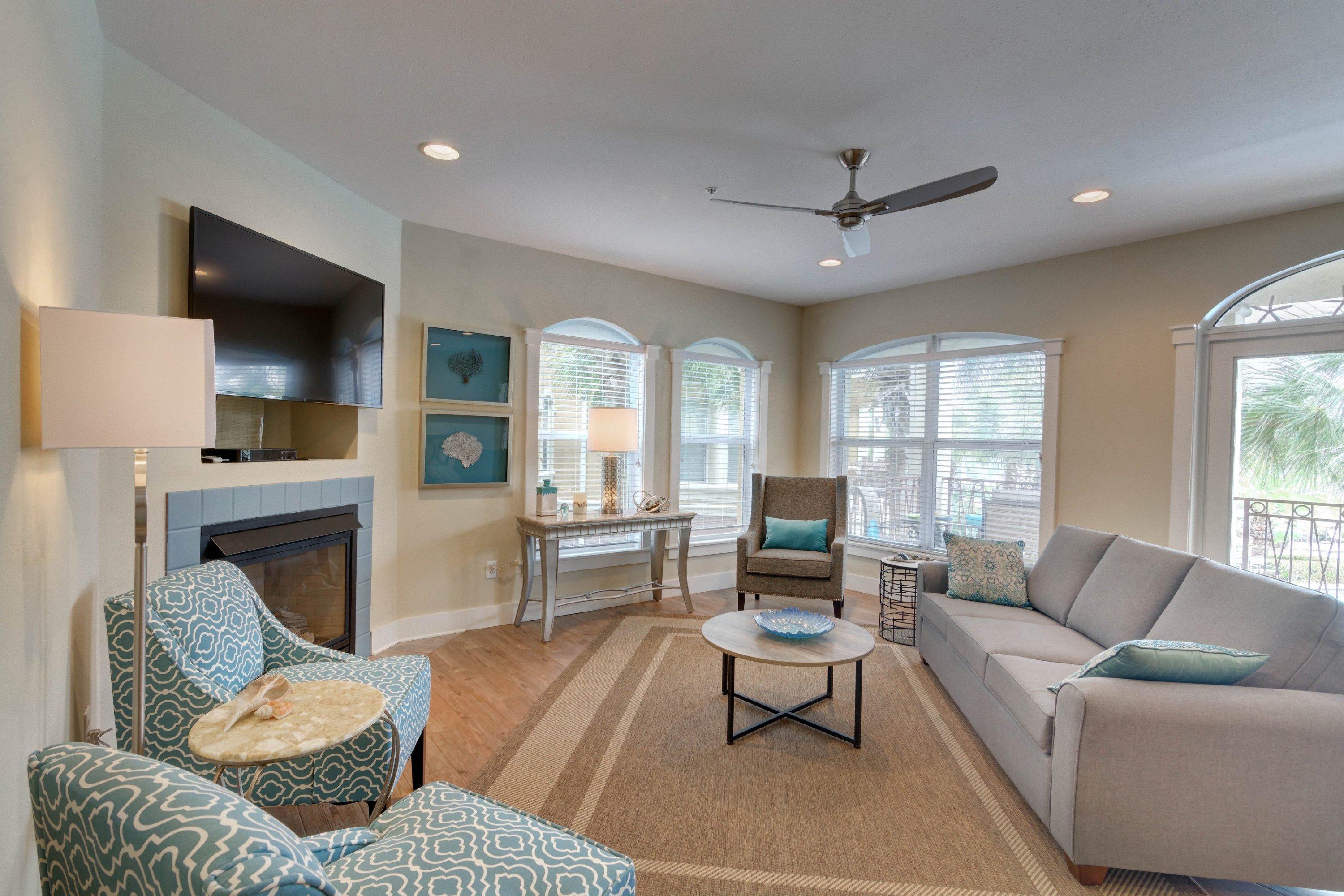 5 Seacrest Blvd Inlet Beach, Unit B201 Inlet Beach, FL 32461 - Photo 19 of 38 a living room with furniture and a fireplace