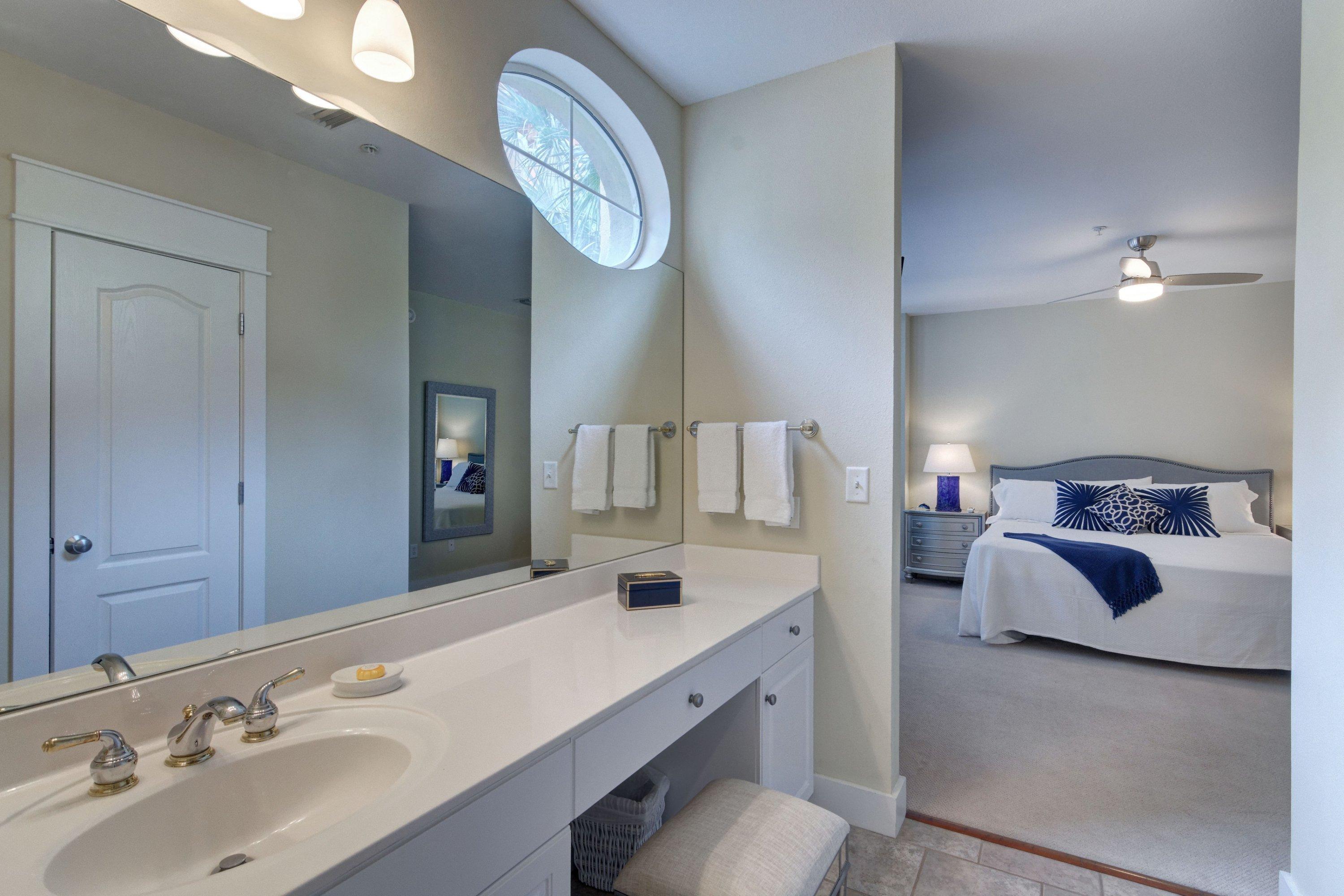 5 Seacrest Blvd Inlet Beach, Unit B201 Inlet Beach, FL 32461 - Photo 26 of 38 a bathroom with a sink and a mirror