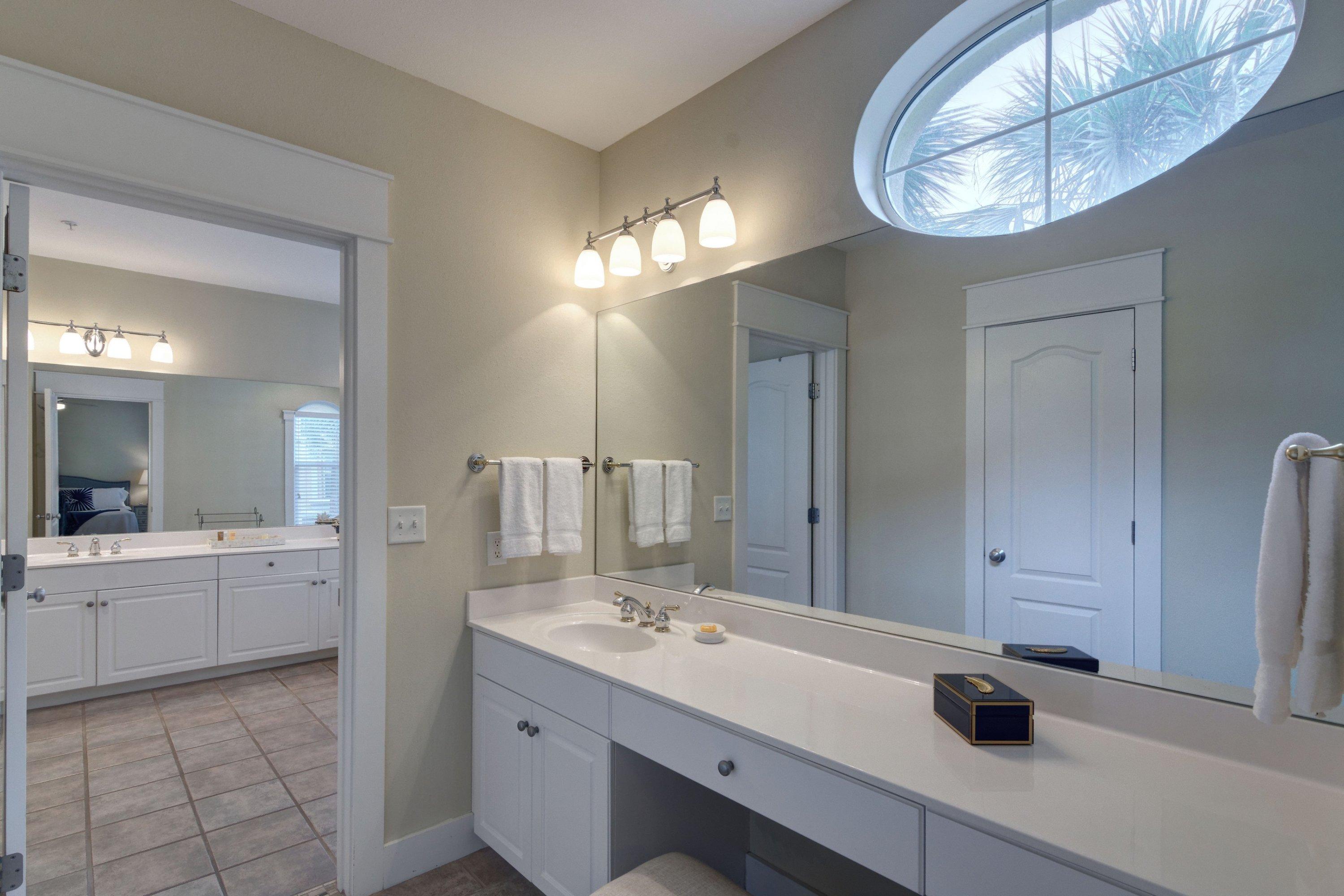 5 Seacrest Blvd Inlet Beach, Unit B201 Inlet Beach, FL 32461 - Photo 27 of 38 a bathroom with a double vanity sink and a mirror