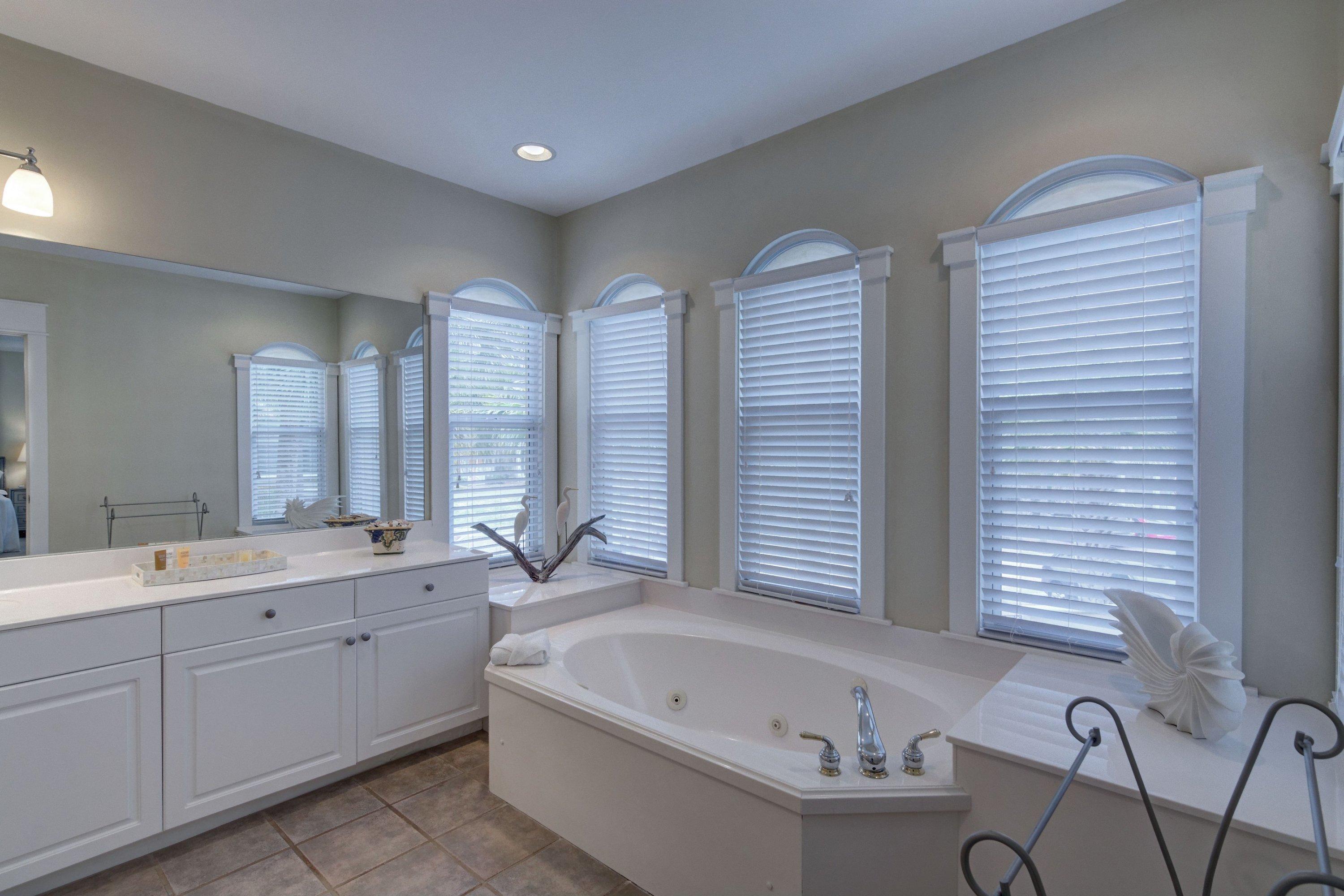 5 Seacrest Blvd Inlet Beach, Unit B201 Inlet Beach, FL 32461 - Photo 28 of 38 a bathroom with a granite countertop sink and a bathtub