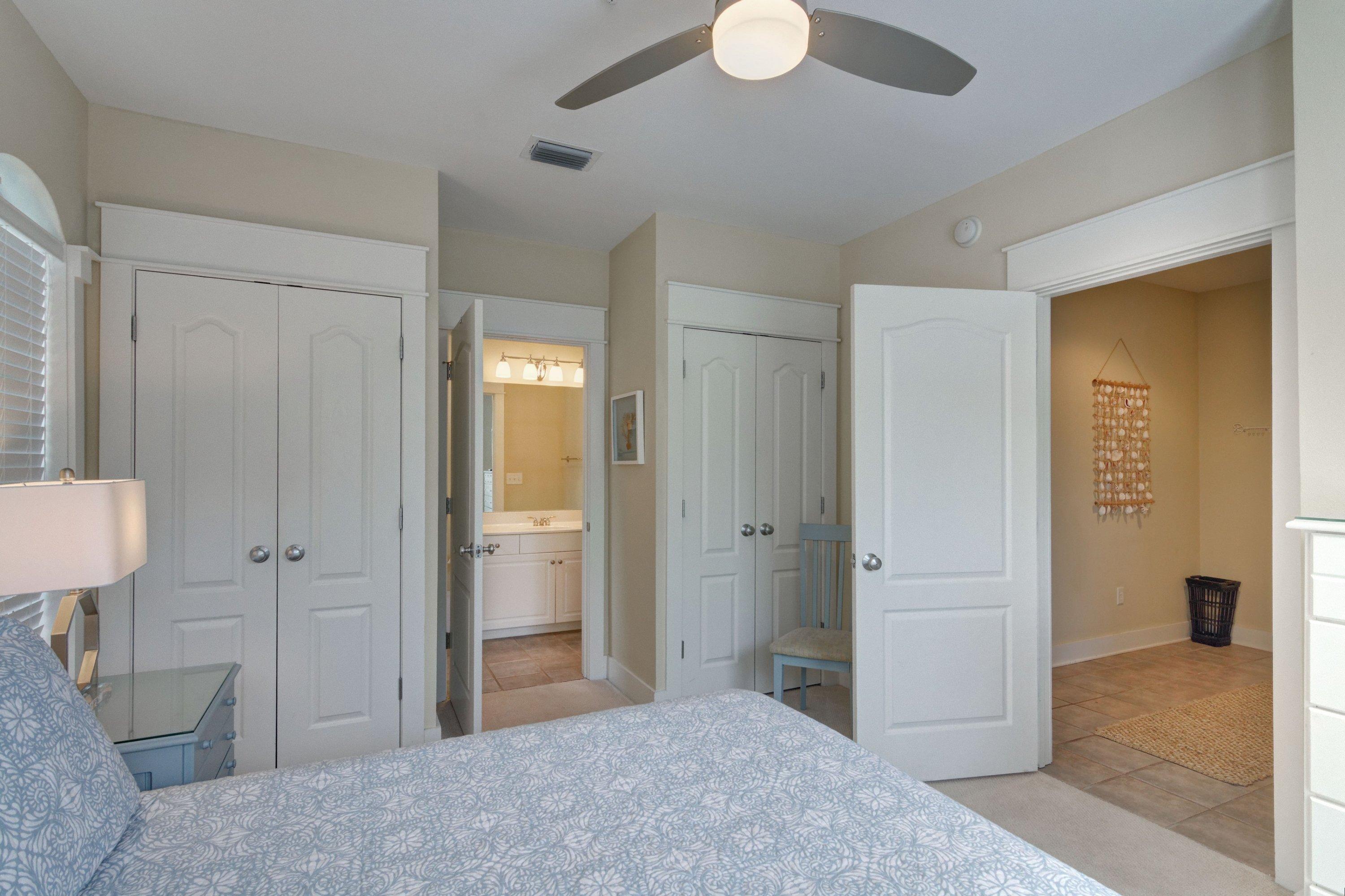 5 Seacrest Blvd Inlet Beach, Unit B201 Inlet Beach, FL 32461 - Photo 30 of 38 a bedroom with a bed and a table in it