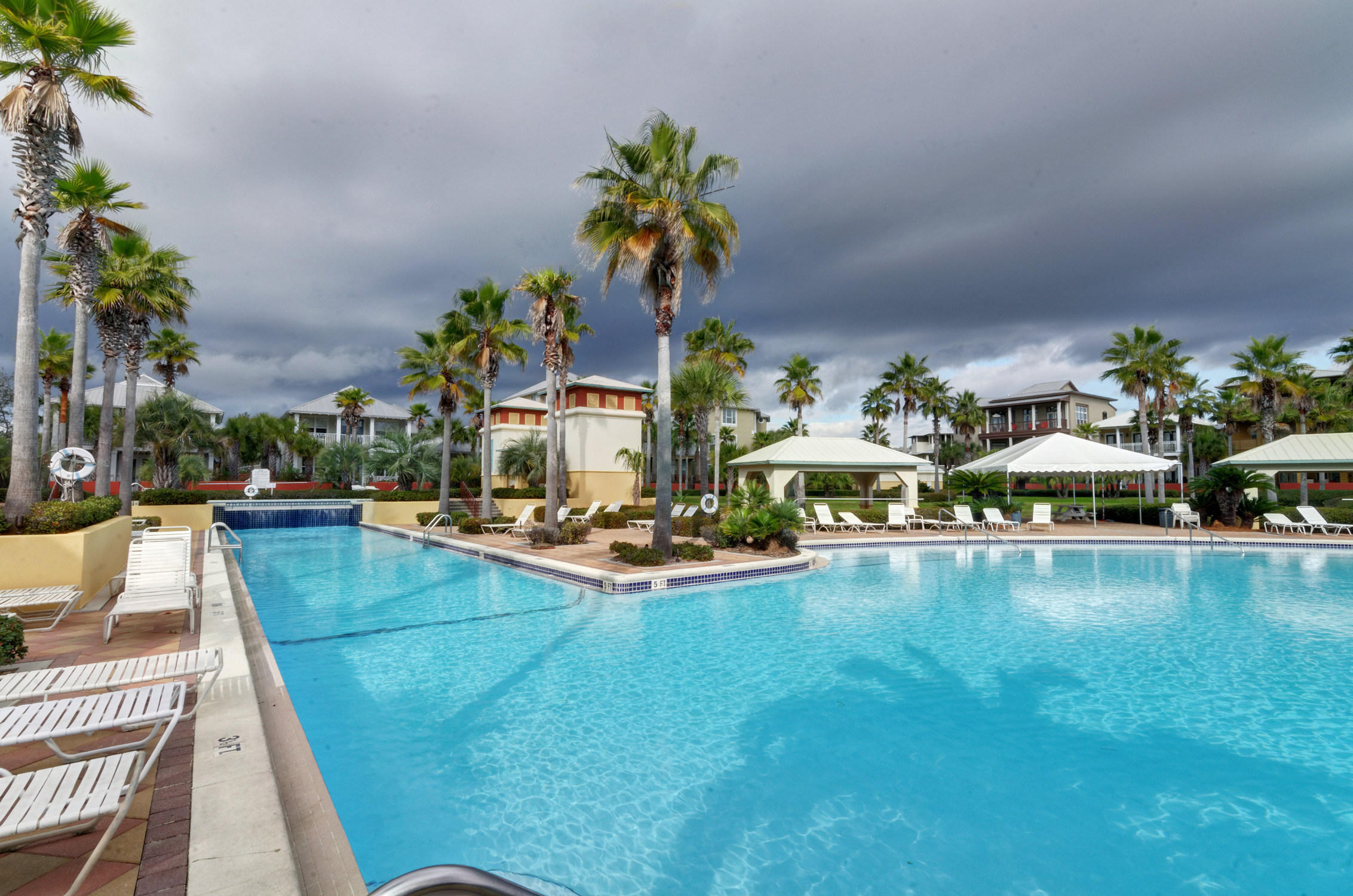5 Seacrest Blvd Inlet Beach, Unit B201 Inlet Beach, FL 32461 - Photo 4 of 38 a view of a swimming pool with sitting area
