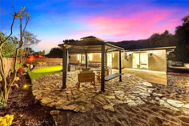 a view of an outdoor space pool patio and outdoor seating