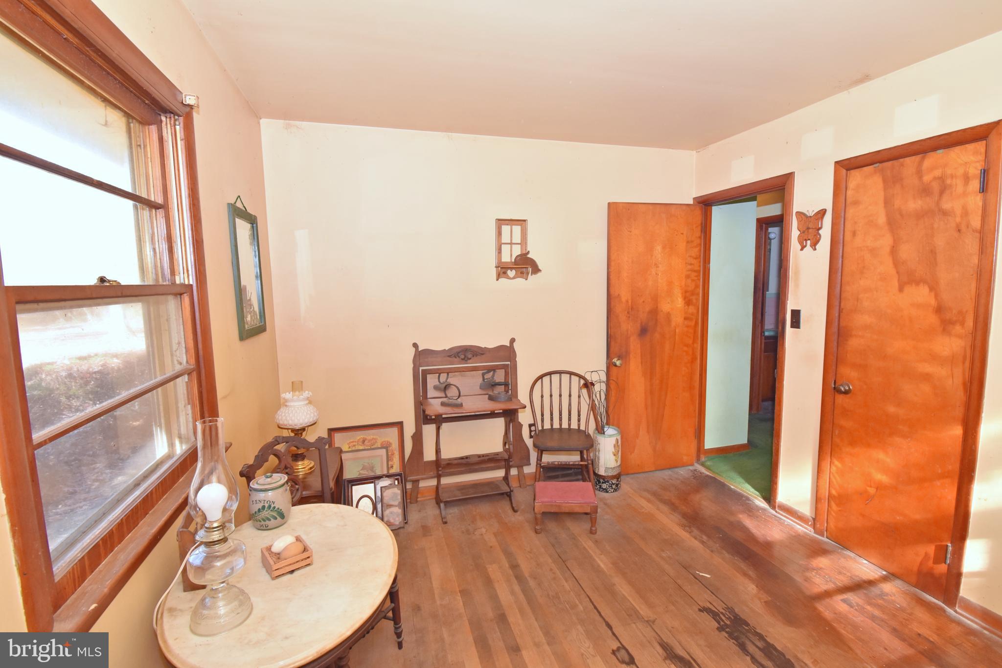 4301 Tyaskin Road Tyaskin, MD 21865 - Photo 11 of 43 a view of a livingroom with furniture window and wooden floor