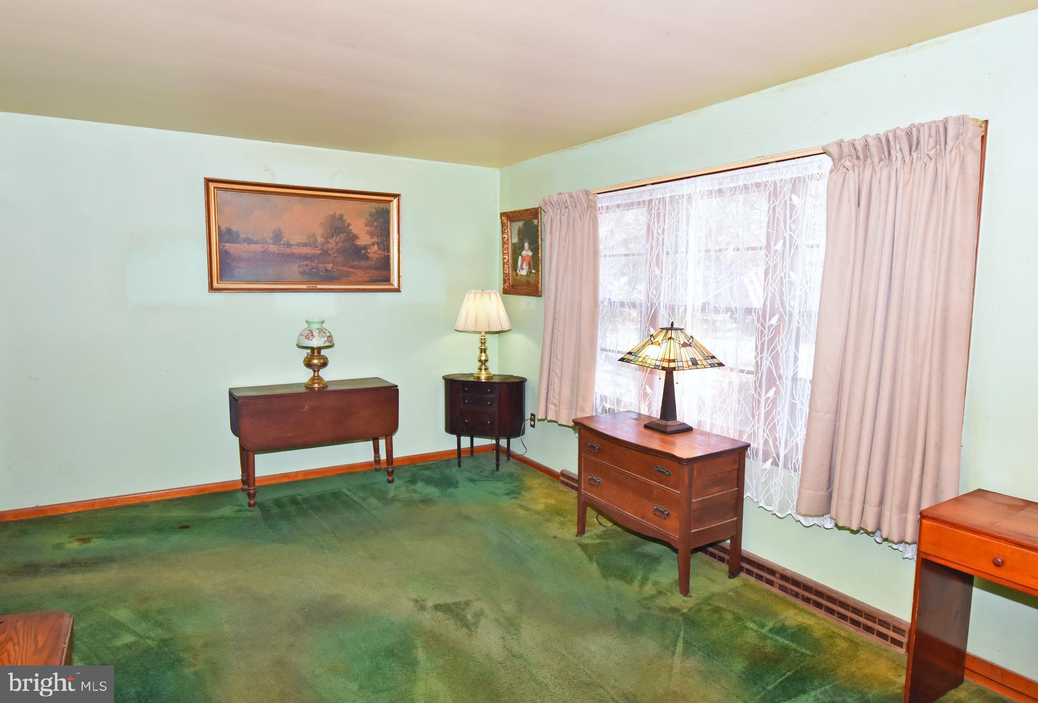 4301 Tyaskin Road Tyaskin, MD 21865 - Photo 17 of 43 a living room with furniture and a window