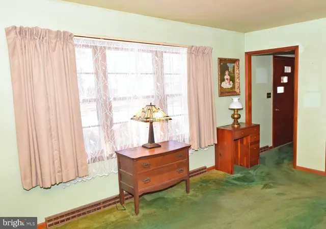 a room with furniture and a window