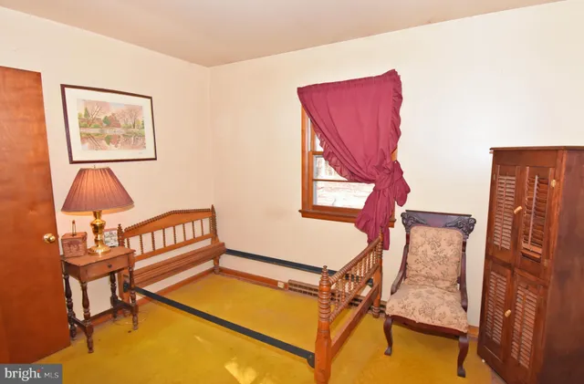 a view of a living room and entryway