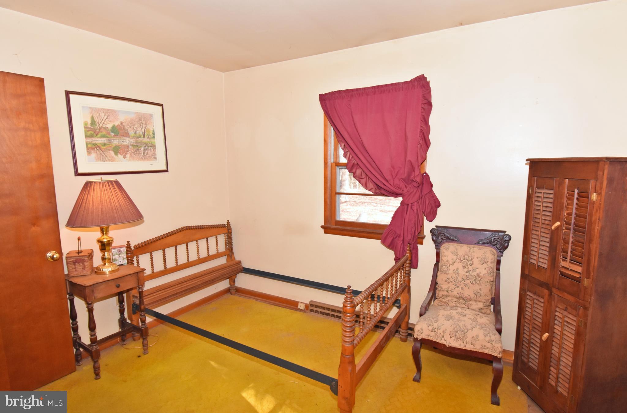 4301 Tyaskin Road Tyaskin, MD 21865 - Photo 21 of 43 a view of a livingroom with furniture and a couch