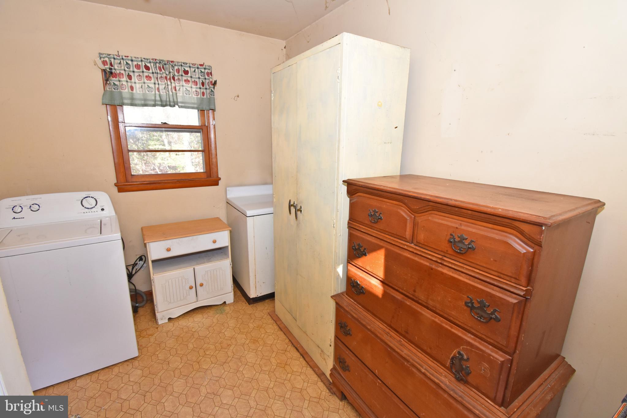 4301 Tyaskin Road Tyaskin, MD 21865 - Photo 27 of 43 a view of a room with storage and utility
