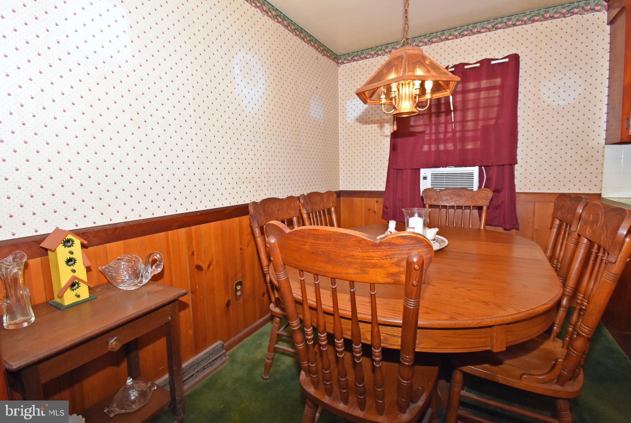 4301 Tyaskin Road Tyaskin, MD 21865 - Photo 3 of 43 a dining room with furniture and a chandelier