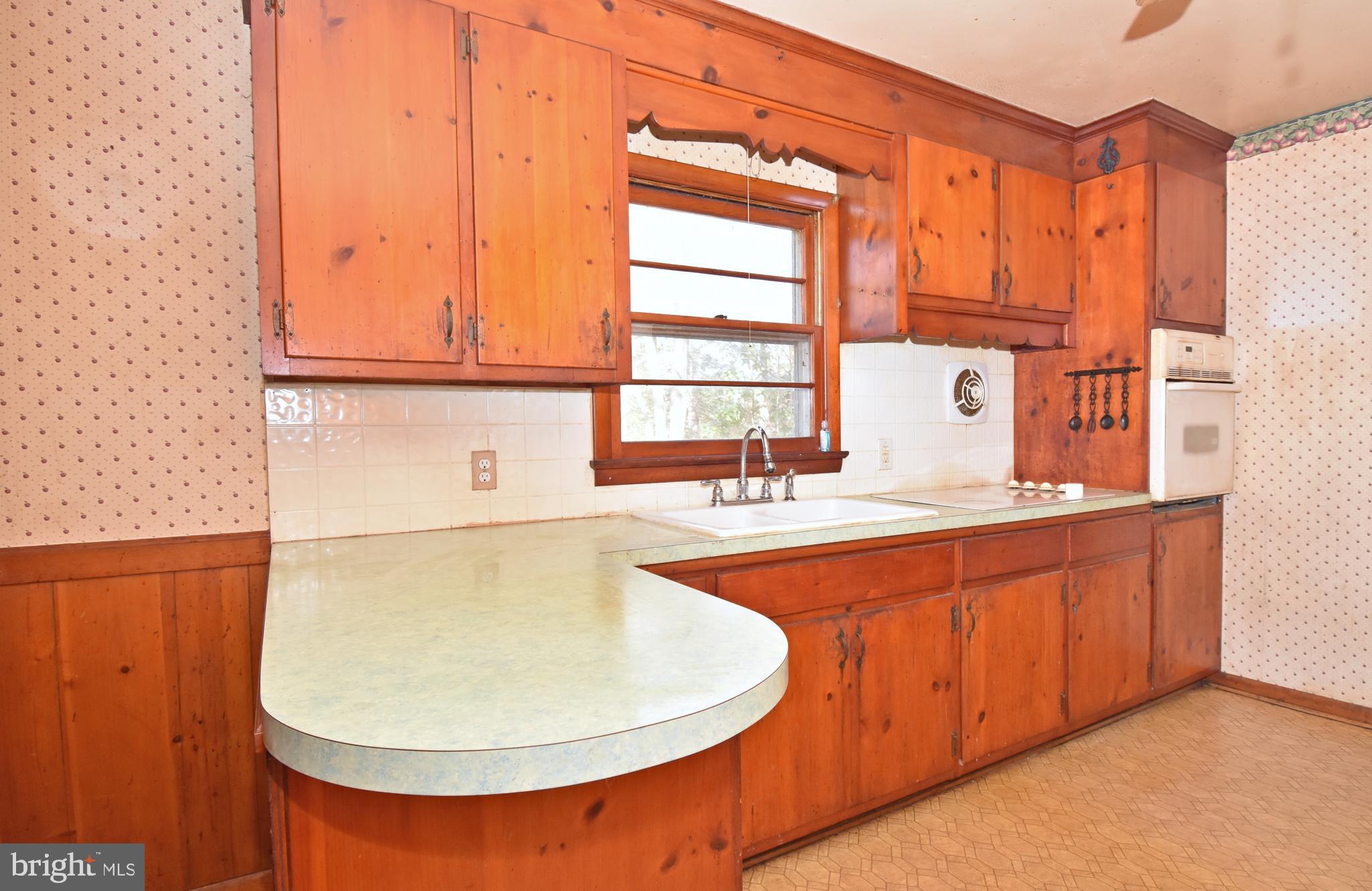 4301 Tyaskin Road Tyaskin, MD 21865 - Photo 6 of 43 a bathroom with a sink and a mirror