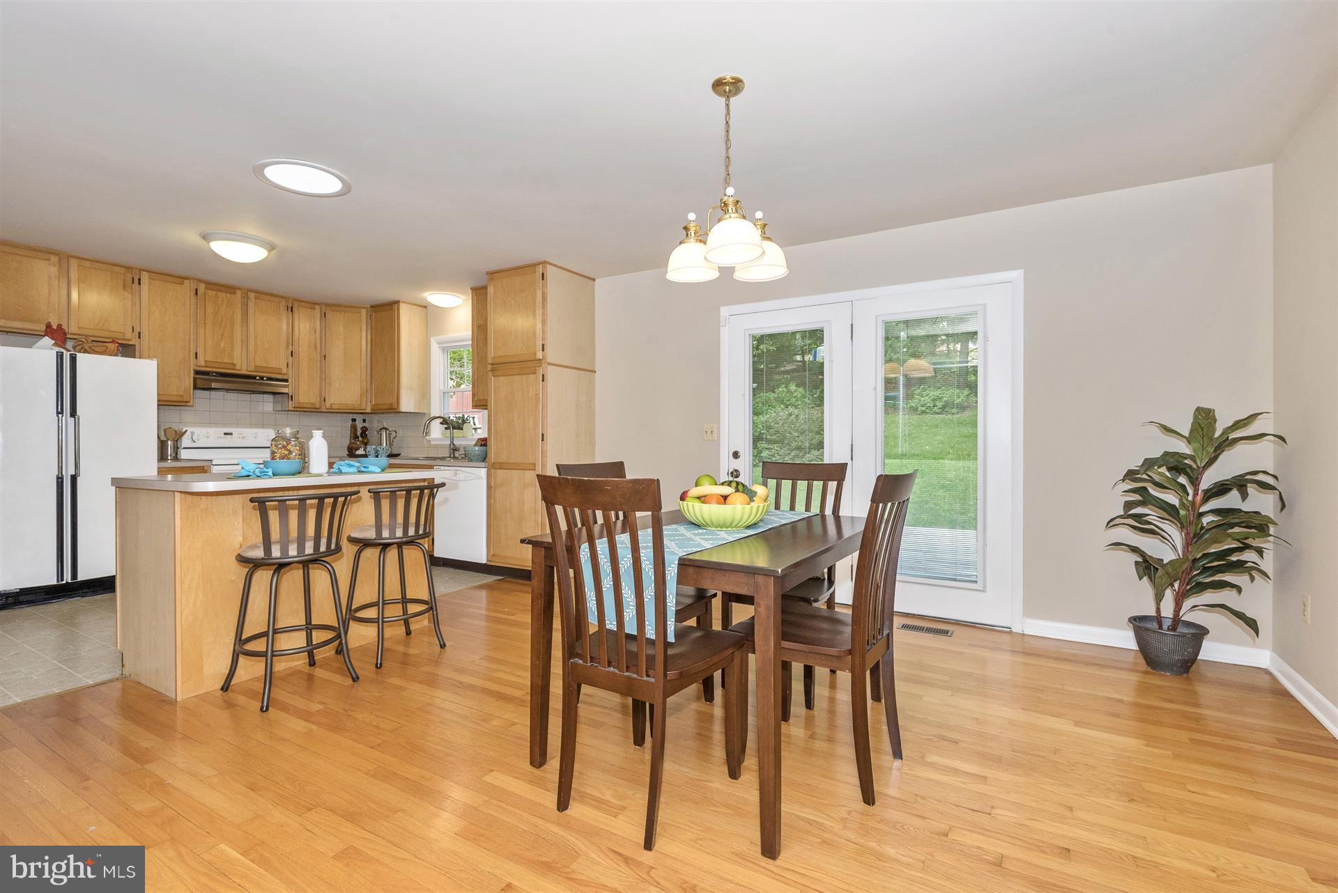 8835 Indian Springs Road Frederick, MD 21702 - Photo 8 of 30 Dining area off of kitchen w/patio door to deck
