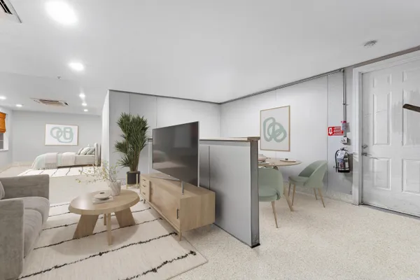 a view of an chairs and table in the patio