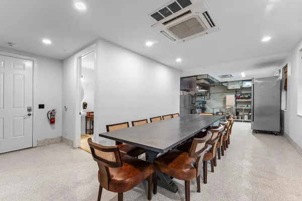 a view of a dining room with furniture