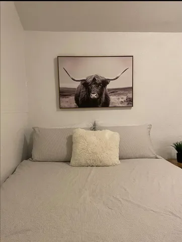 a view of swimming pool with seating area