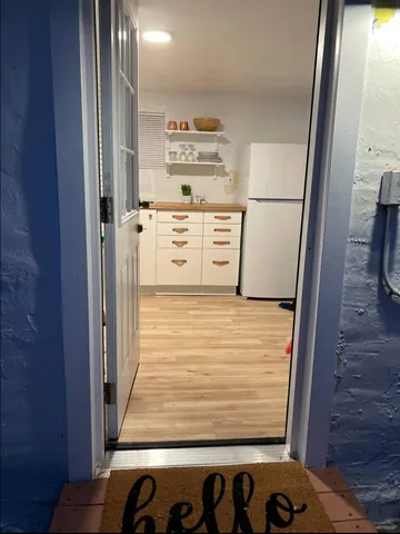 a backyard of a house with lots of green space