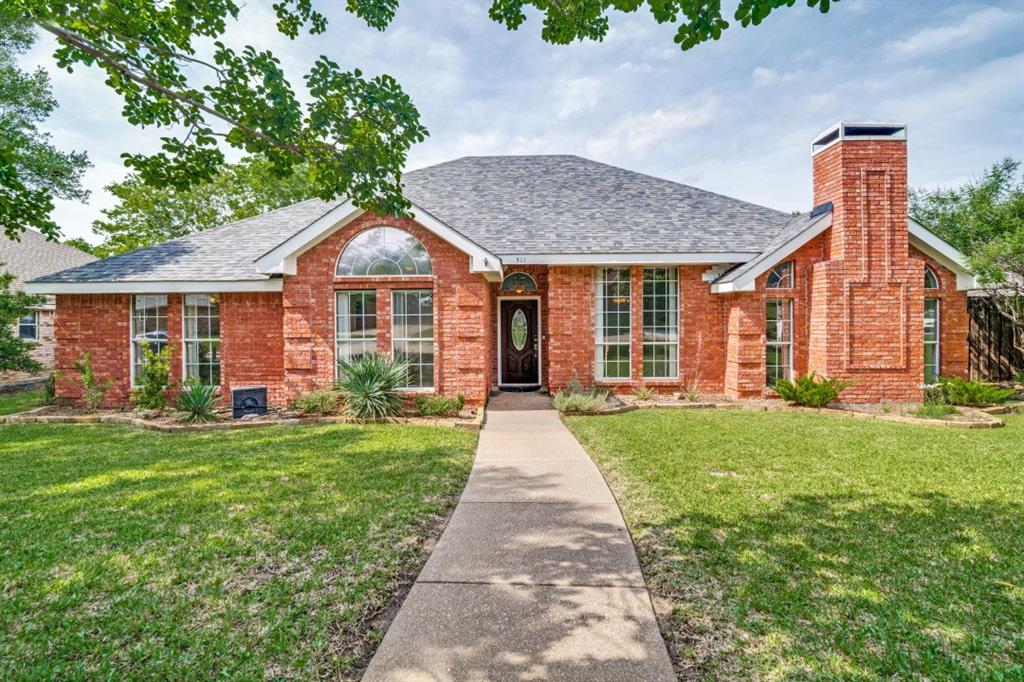 511 Windsor Way Rockwall, TX 75087 - Photo 1 of 1 front view of a house with a yard
