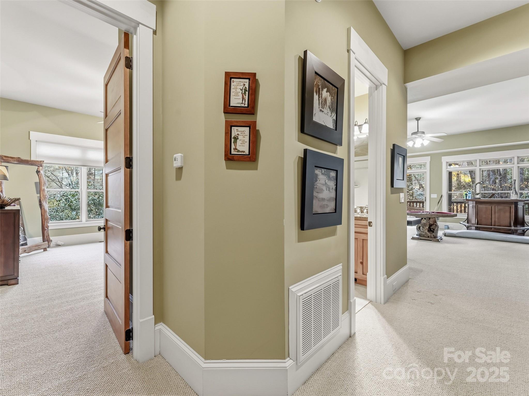 129 Ivy Ridge, Unit I26 Lake Toxaway, NC 28747 - Photo 24 of 39 a view of a hallway with bathroom and front door