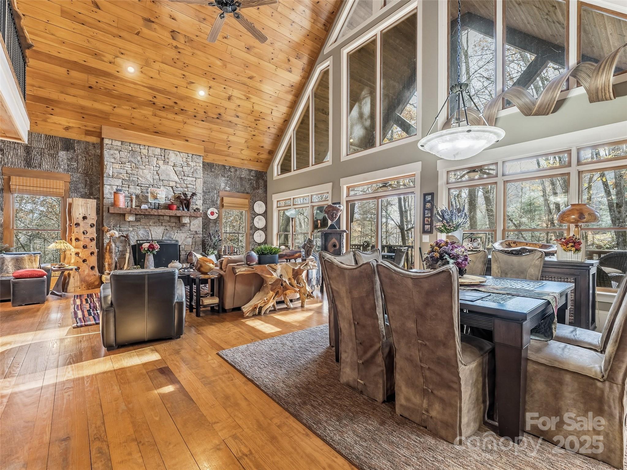 129 Ivy Ridge, Unit I26 Lake Toxaway, NC 28747 - Photo 3 of 39 a view of a patio with dining table and chairs