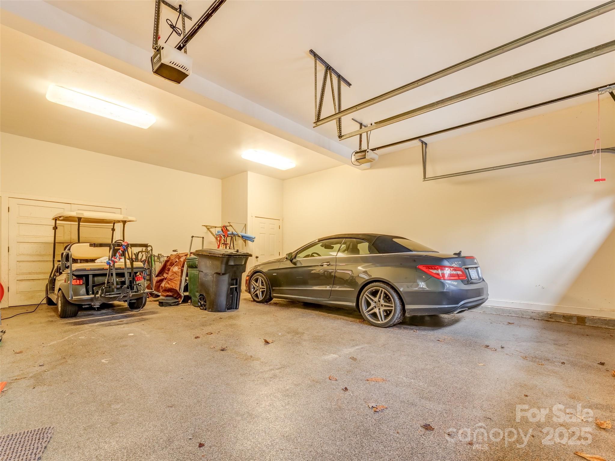 129 Ivy Ridge, Unit I26 Lake Toxaway, NC 28747 - Photo 31 of 39 a view of parking garage with cars