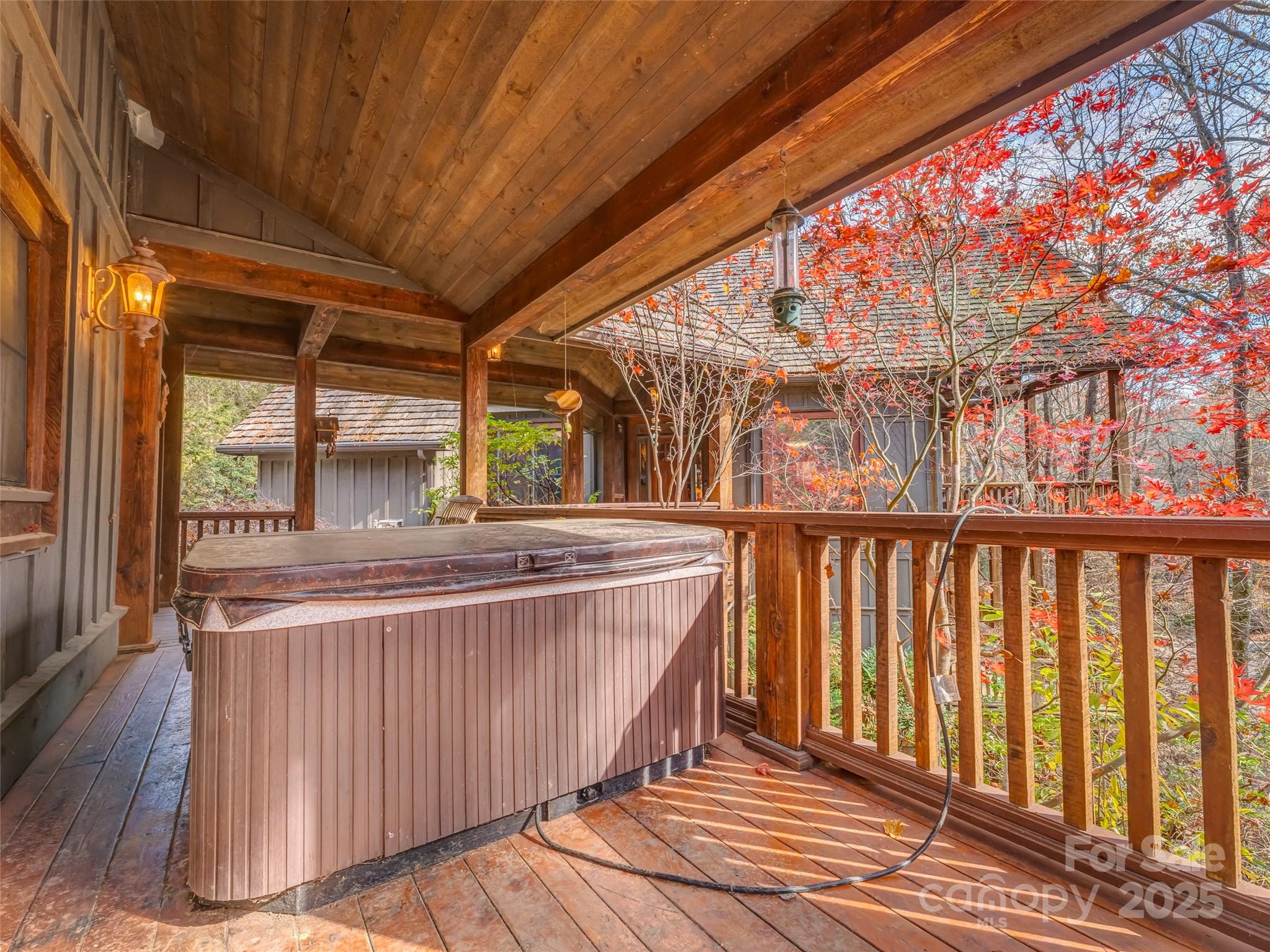 129 Ivy Ridge, Unit I26 Lake Toxaway, NC 28747 - Photo 38 of 39 a spacious bathroom with a large window and a sink