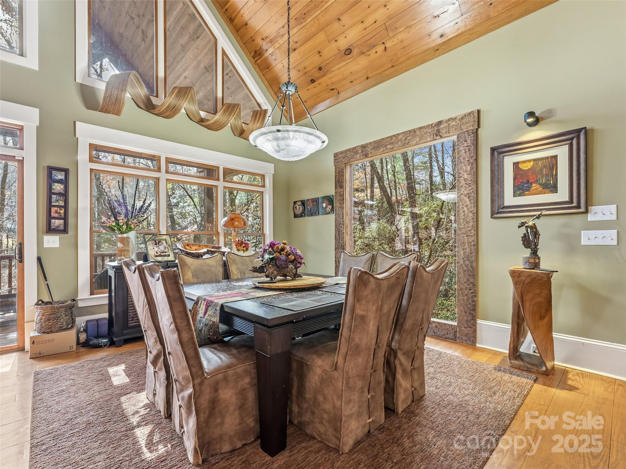 129 Ivy Ridge, Unit I26 Lake Toxaway, NC 28747 - Photo 5 of 39 a view of a dining room with furniture window and outside view