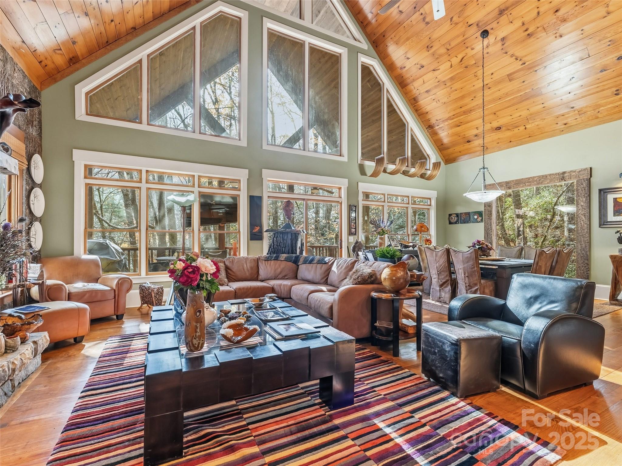 129 Ivy Ridge, Unit I26 Lake Toxaway, NC 28747 - Photo 8 of 39 a outdoor living and patio area with furniture