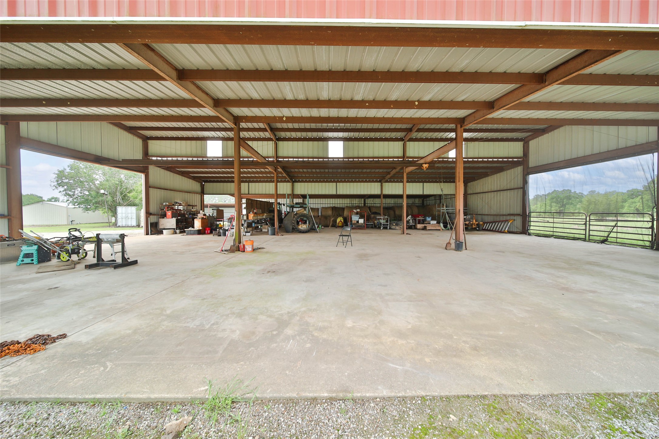 128 Duke Road Bedias, TX 77831 - Photo 41 of 50 Red Barn Interior Side View