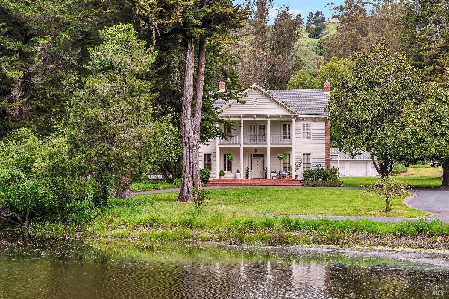 End of land privacy and behind a gated entry is this magnificent equestrian estate.