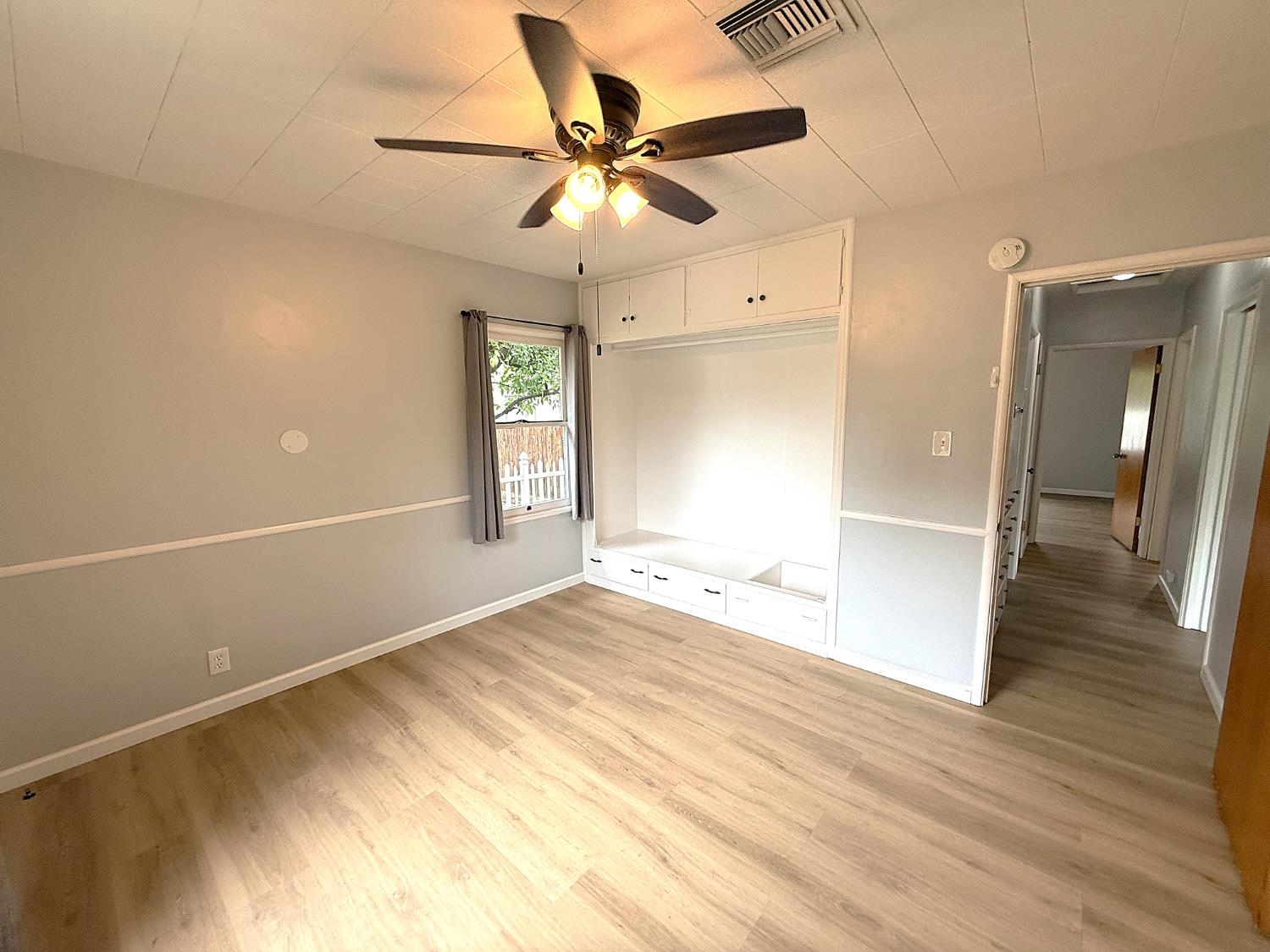 809 South Sowell Street Visalia, CA 93277 - Photo 26 of 58 a view of an empty room and wooden floor