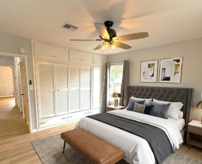 809 South Sowell Street Visalia, CA 93277 - Photo 35 of 58 a bedroom with a large bed and a window