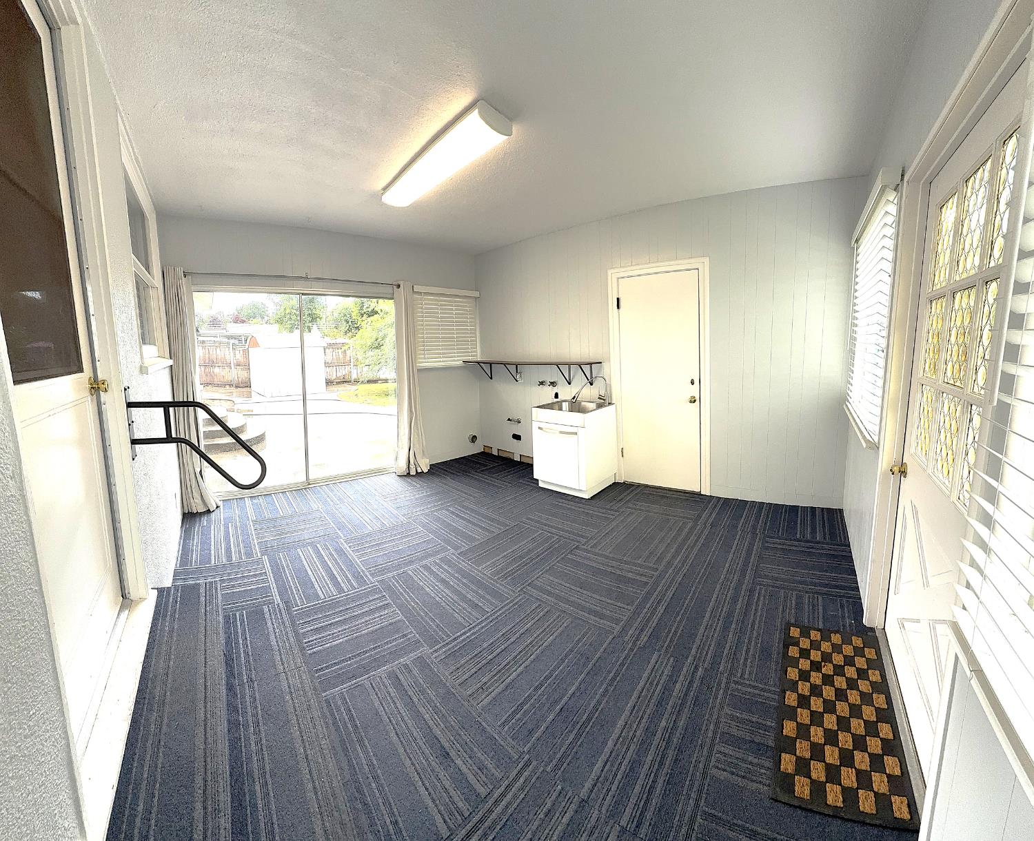 809 South Sowell Street Visalia, CA 93277 - Photo 48 of 58 a view of empty room with wooden floor and window