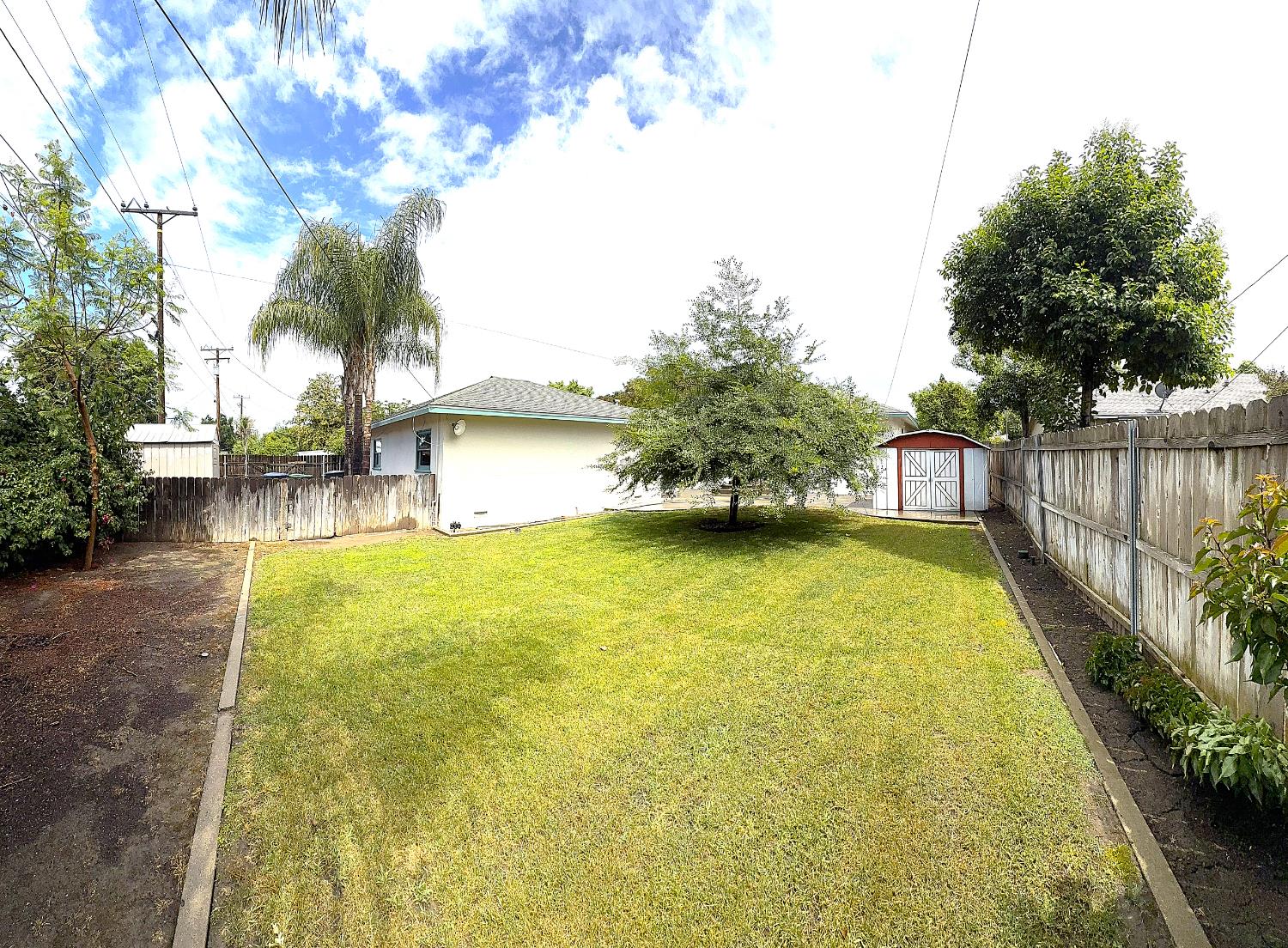 809 South Sowell Street Visalia, CA 93277 - Photo 53 of 58 a view of a swimming pool with a patio