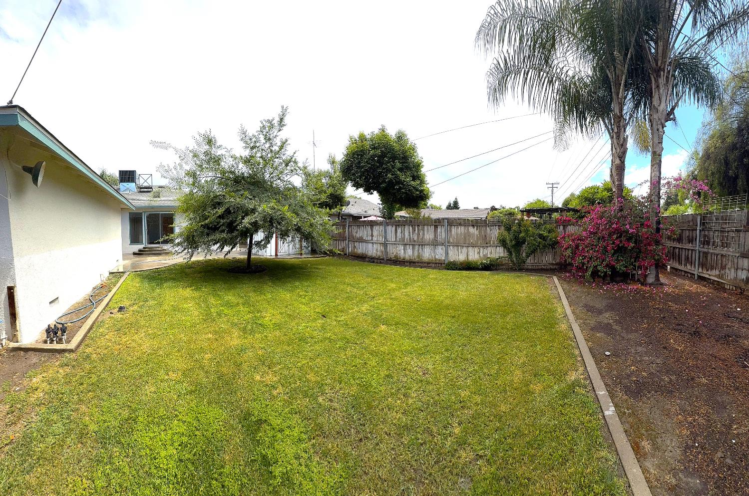 809 South Sowell Street Visalia, CA 93277 - Photo 55 of 58 a view of a swimming pool with a garden