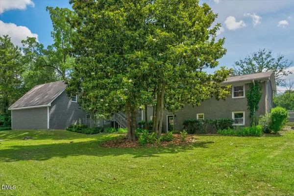 a view of a backyard with a garden