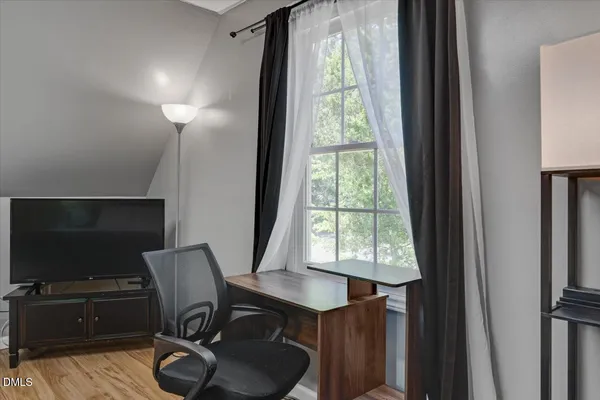 a backyard of a house with seating space