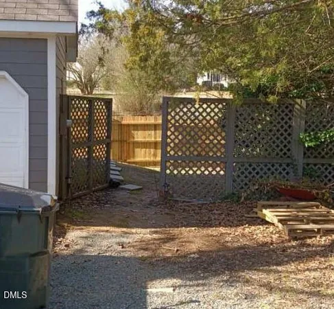 a bedroom with a bed and a cabinets